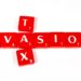 TAX EVASION spelt out in red lettered tiles.